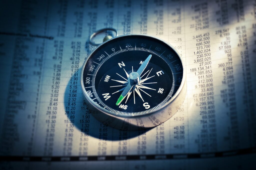 compass, newspaper, finance-2779371.jpg